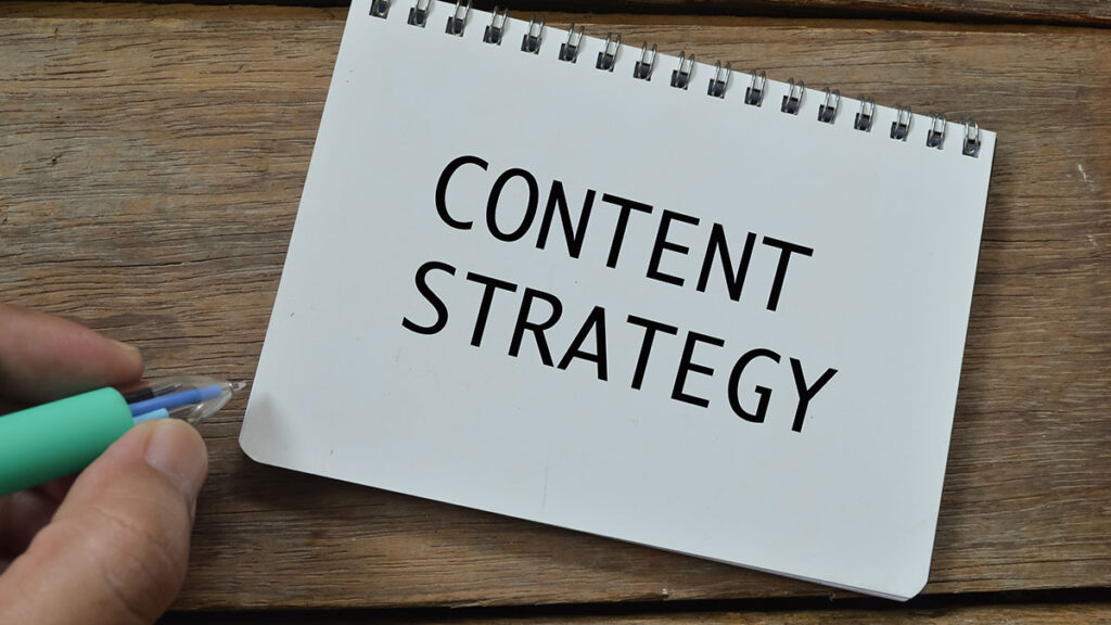 Image of the words content strategy written on a notepad
