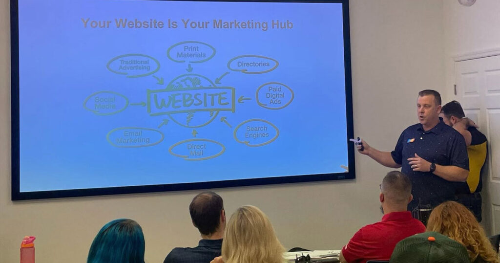 Ocala business owners meeting with local marketing agency
