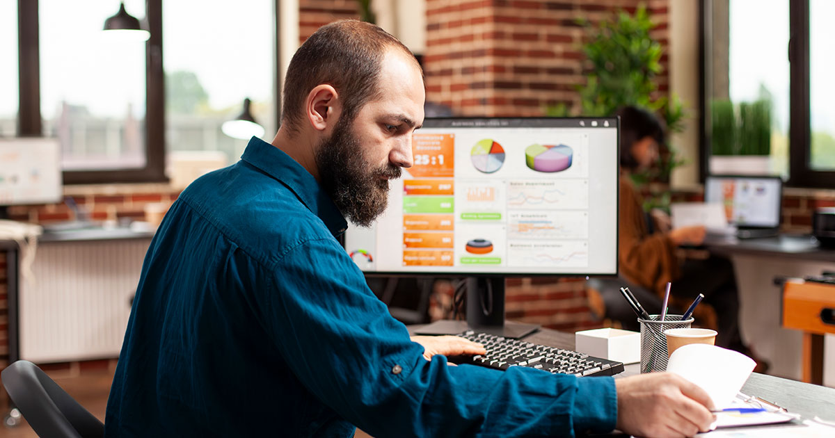 business owner reviewing web design options in Ocala